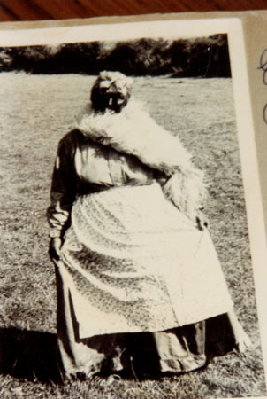 Copy of a photograph of a lady in costume posing for a photograph at Llangwm Carnival 1954 Pembrokeshire